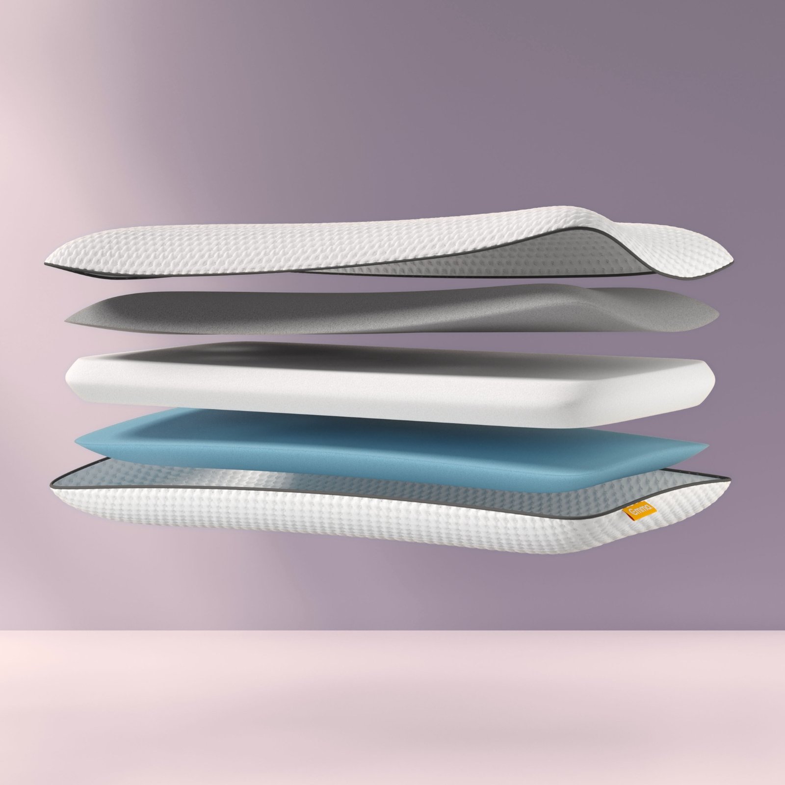 Exploded view van het Original Cooling Adapt Kussen met vier afzonderlijke lagen: bovenste witte laag met geribbelde textuur, daaronder een grijze comfortlaag, gevolgd door een blauwe ondersteuningslaag en onderaan een oranje basislaag; weergegeven tegen een zachte paarse achtergrond.